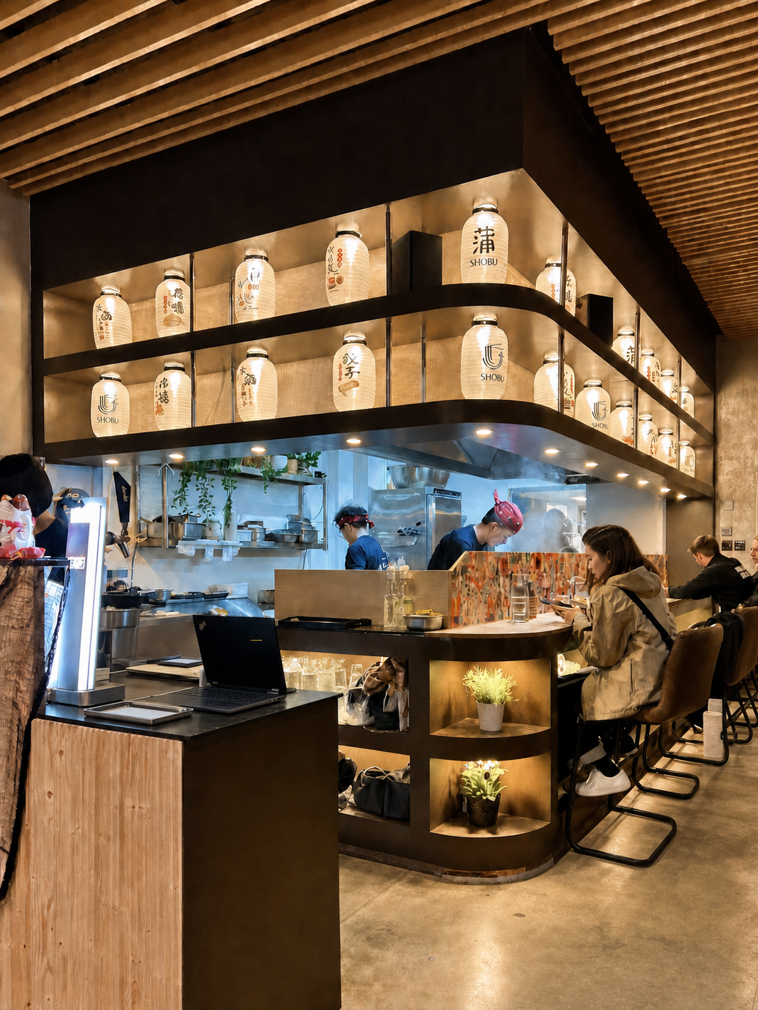 Shobu ramen bar interior with illuminated lanterns