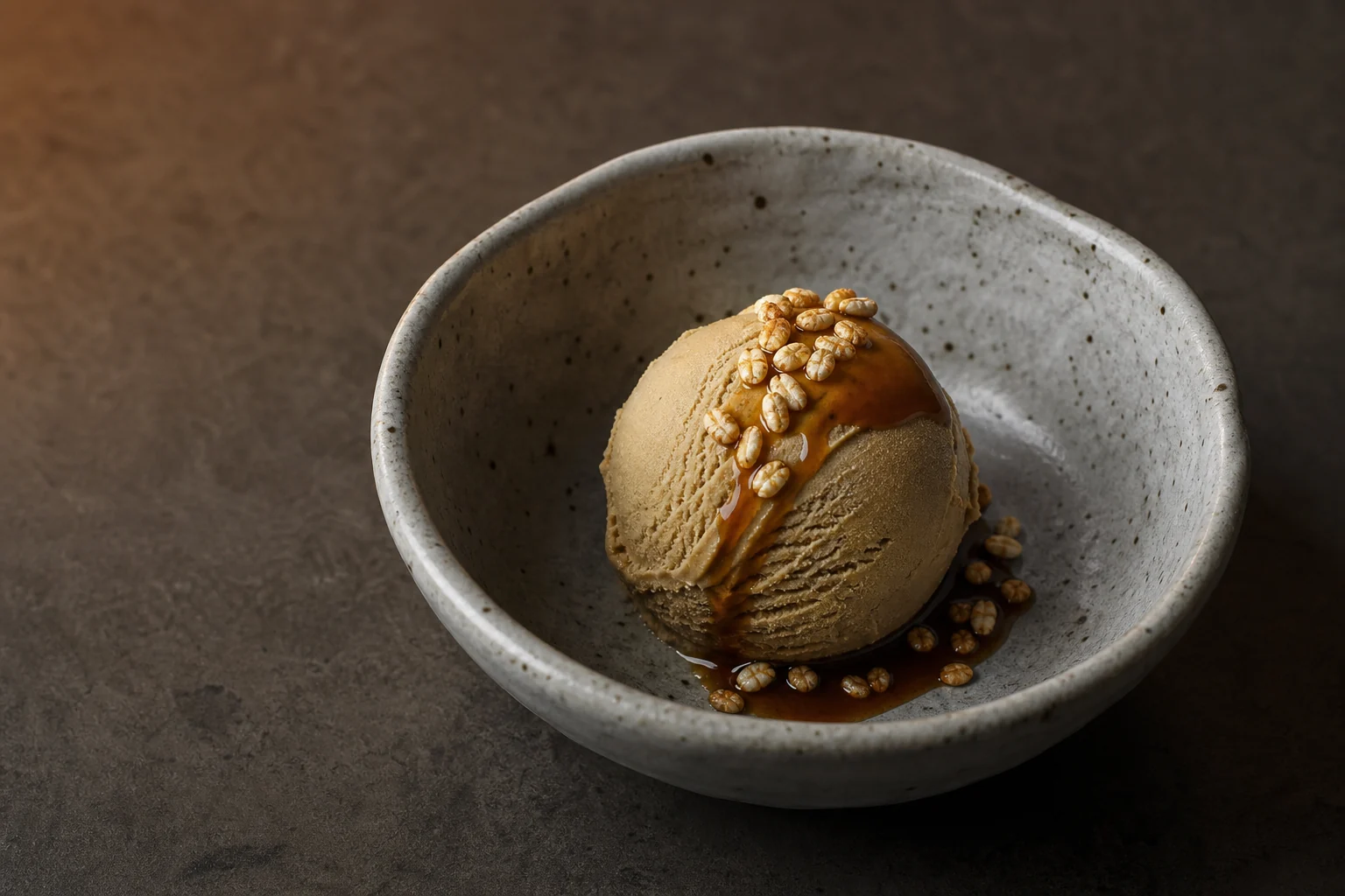 Hojicha ice cream in a ceramic bowl